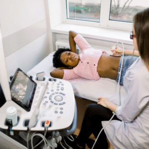 sonographer performing scan on patient